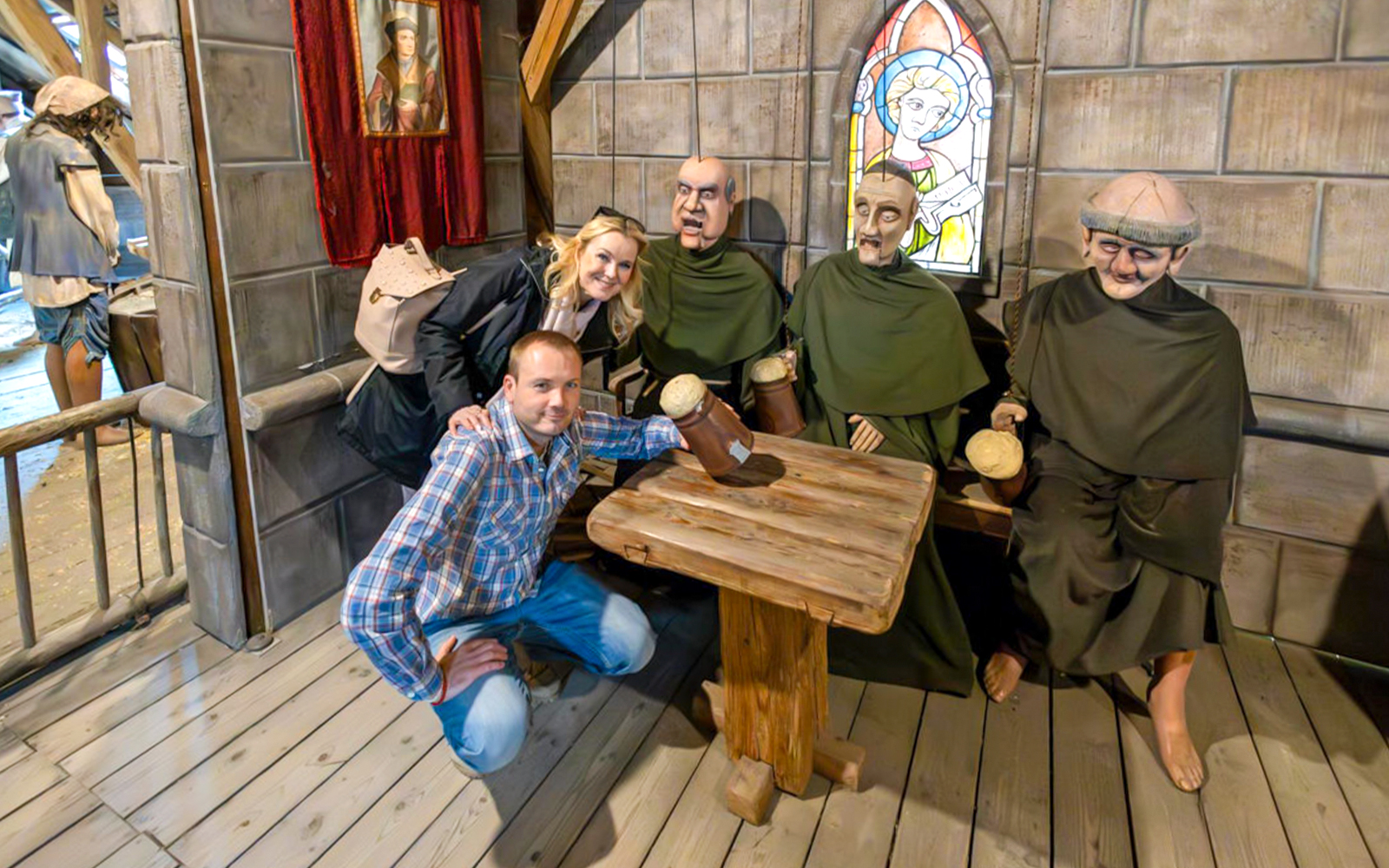 Medieval-themed dinner show with costumed figures at Dětenice Brewery near Prague.