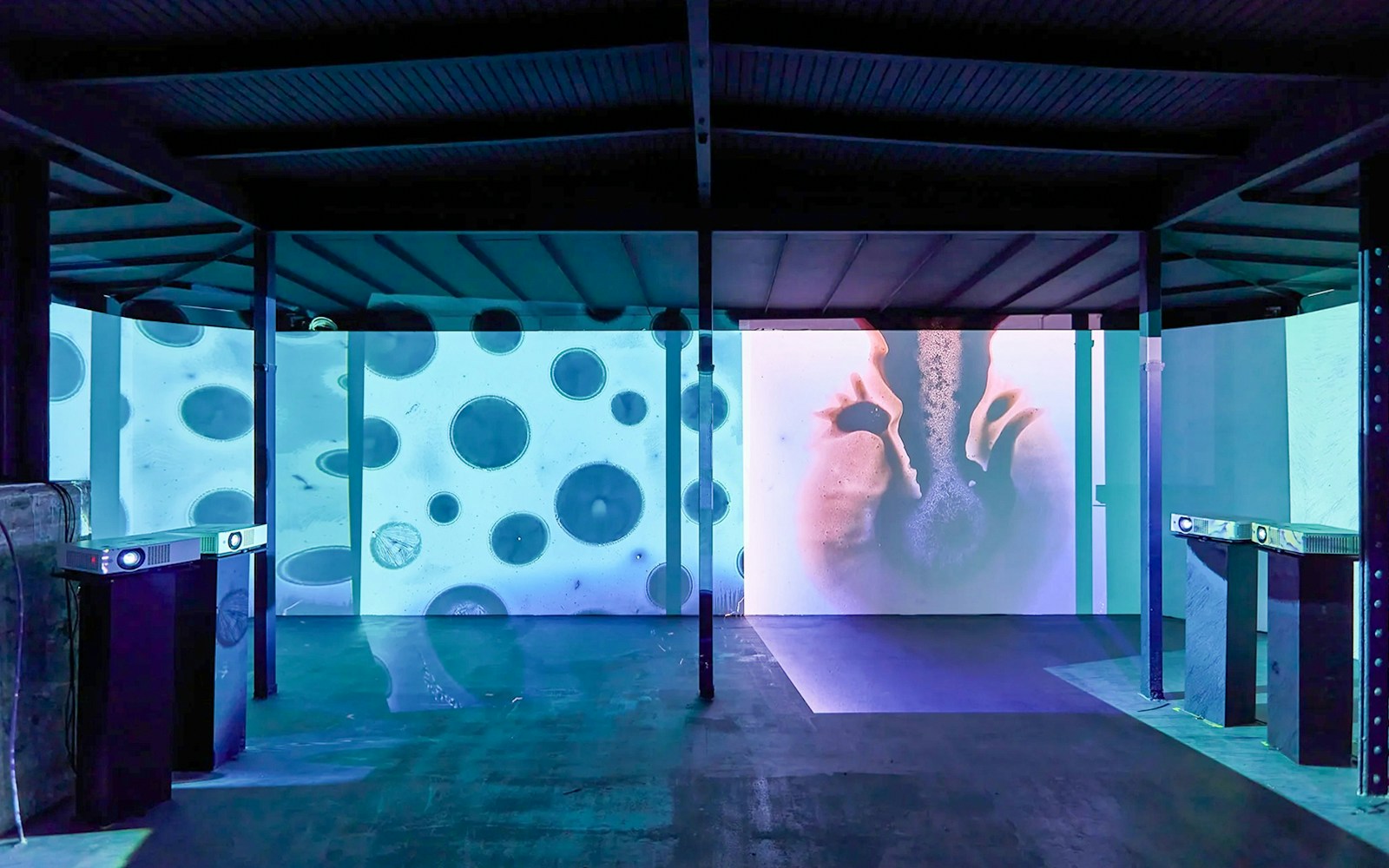 Interactive light projection exhibit at Light Art Museum.