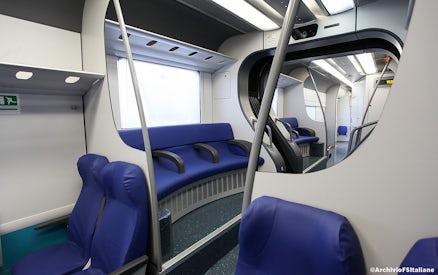 Interior of a train cabin on the route from Fiumicino Airport to Rome Termini Station.
