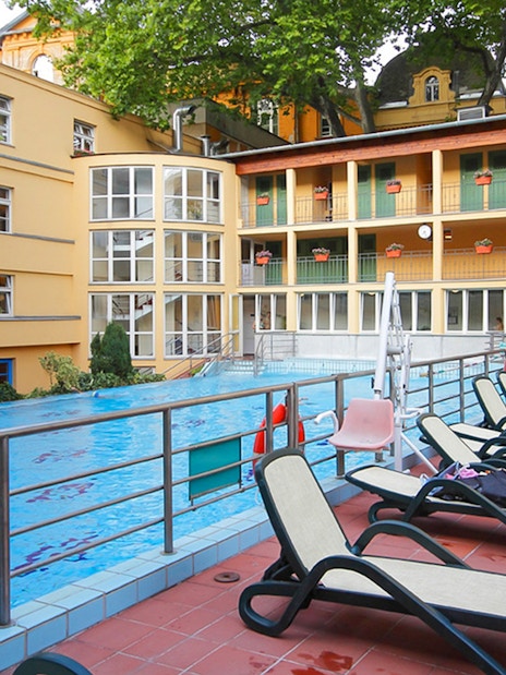 Lounge chairs by the pool at Lukacs Spa, Budapest.