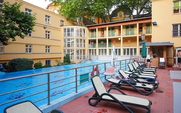 Lounge chairs by the pool at Lukacs Spa, Budapest.