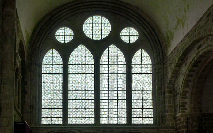 Stained glass windows inside Mont-Saint-Michel Abbey, France.