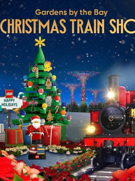 Gardens by the Bay Christmas train show with festive decorations and iconic landmarks.