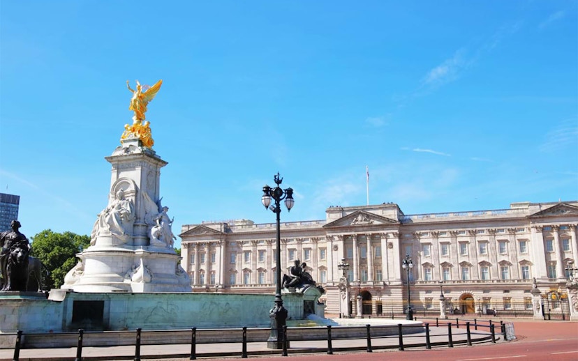 Buckingham Palace facade with Victoria Memorial in London.