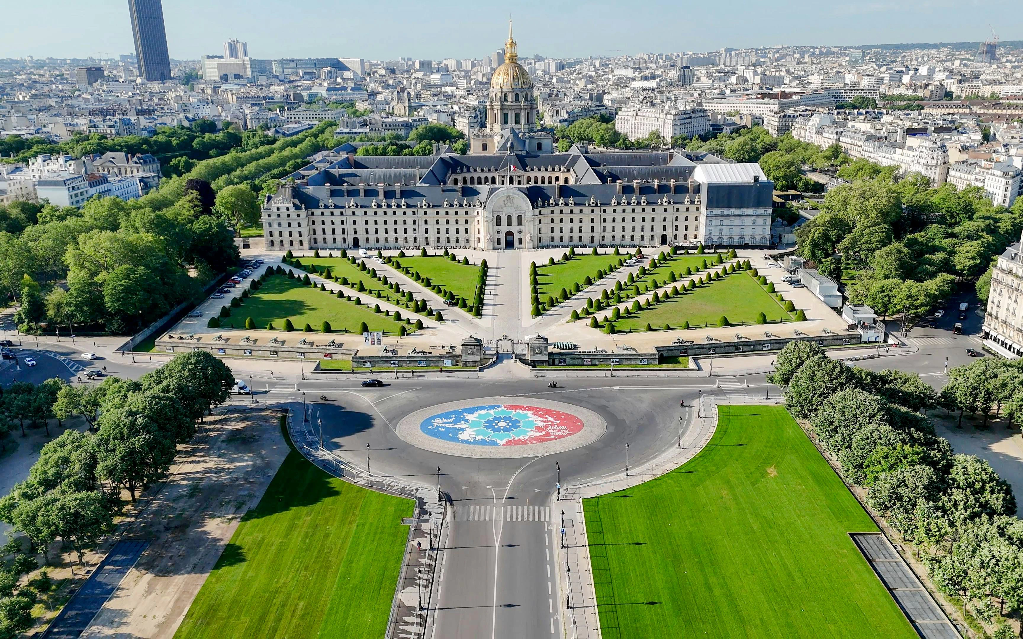 Aerial view of Les Invalides and Esplanade des Invalides in Paris, featuring gardens and the dome.