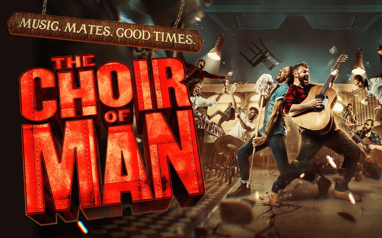 The Choir of Man performance with musicians and dancers in a lively pub setting.