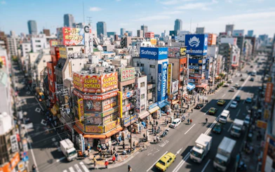 Osaka Den Den Town street with anime and retro game shops.