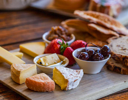 Gourmet cheese and fruit platter on Bruny Island tour.