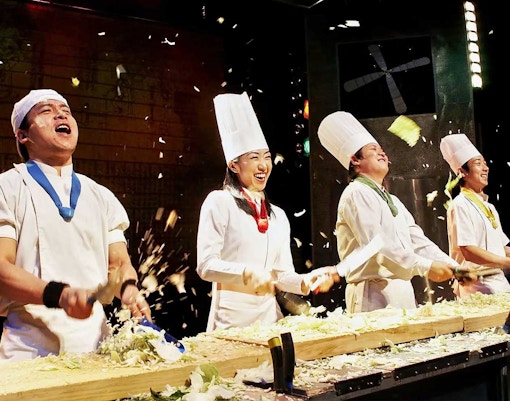 Chefs performing on stage at Seoul Myeongdong Nanta Musical Show.