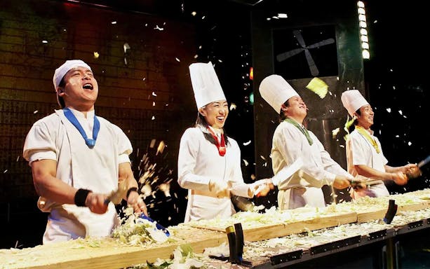 Chefs performing on stage at Seoul Myeongdong Nanta Musical Show.
