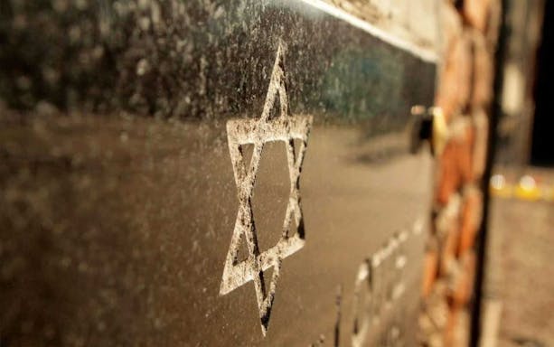 Star of David on a wall in Warsaw's Jewish Heritage area.