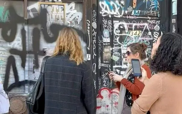 Participants engage in a graffiti exploration game in New York City.