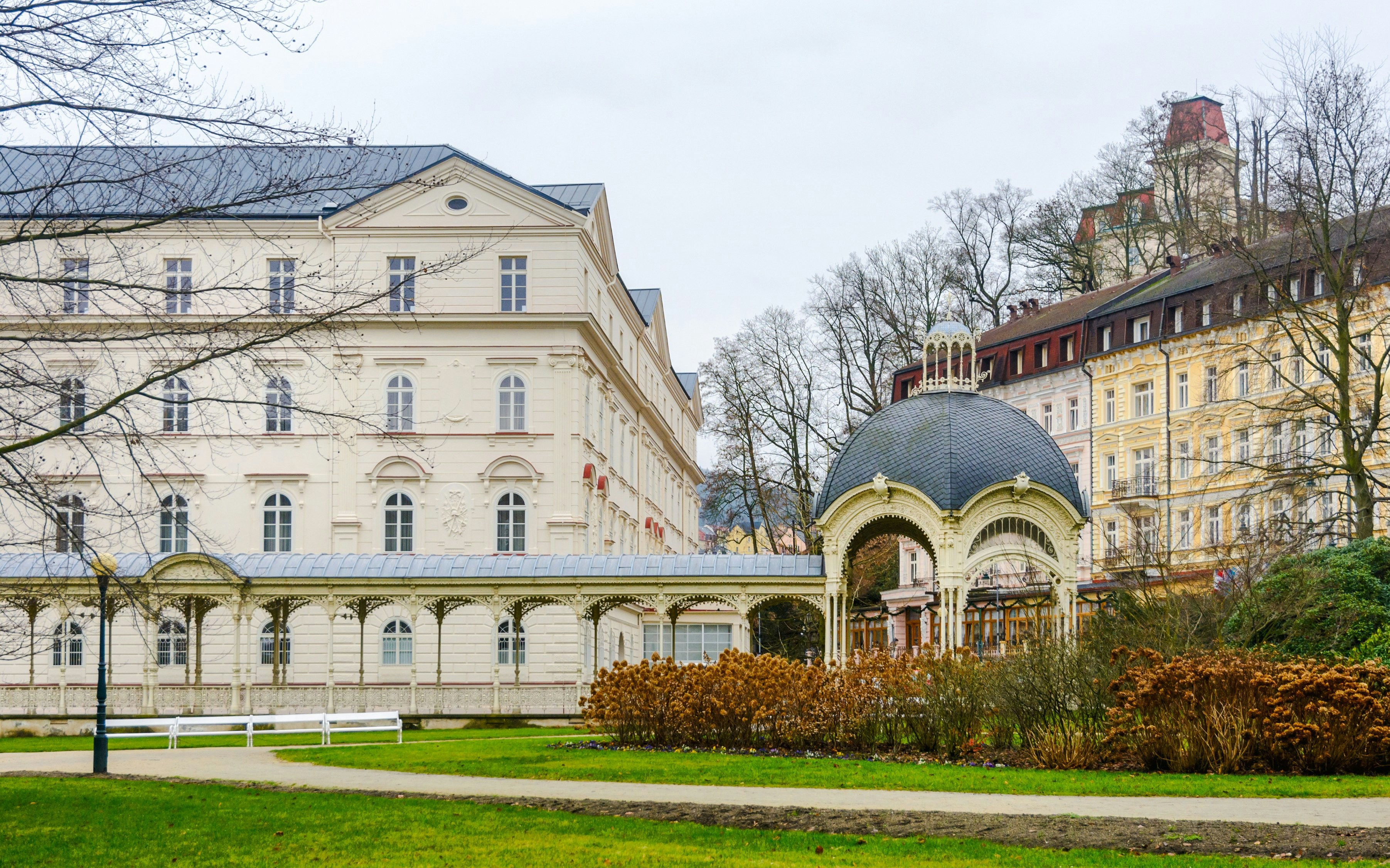 Hot Spring Colonnade with ornate architecture and surrounding historic buildings in Karlovy Vary.