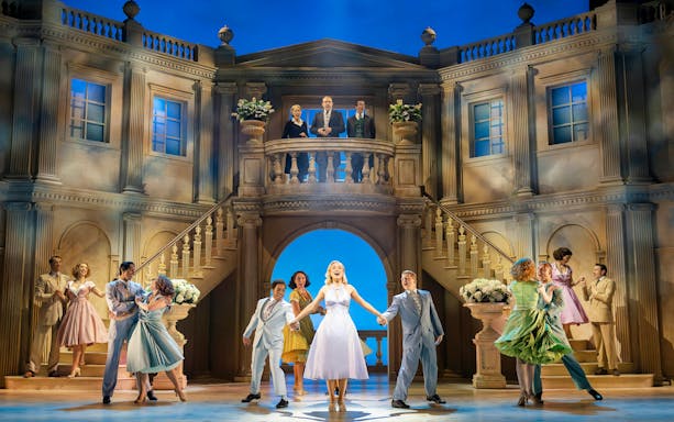 Stage performance of High Society musical in West End theater.