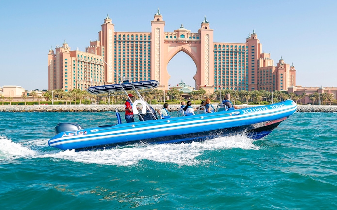 Speedboat cruising near Atlantis, The Palm in Dubai.