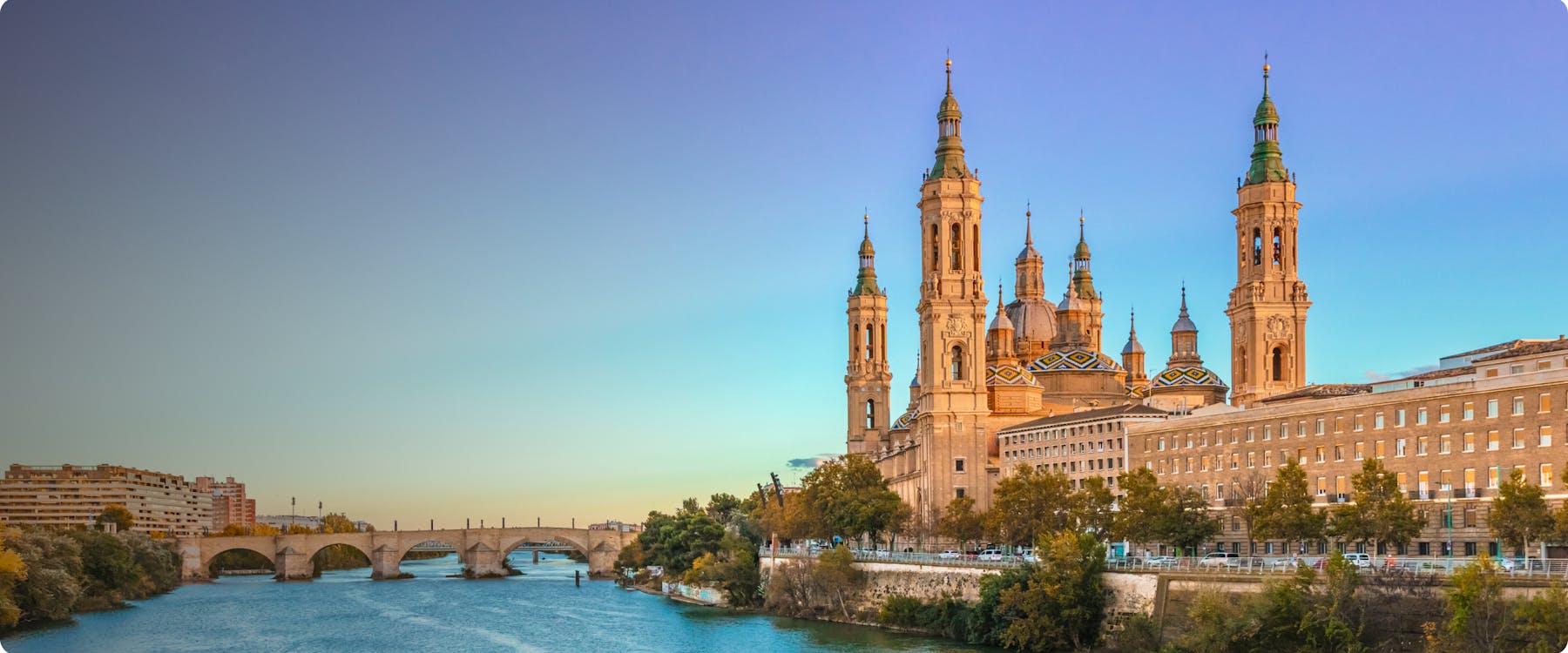 Basilica of Our Lady of the Pillar and Ebro River in Zaragoza, Spain.