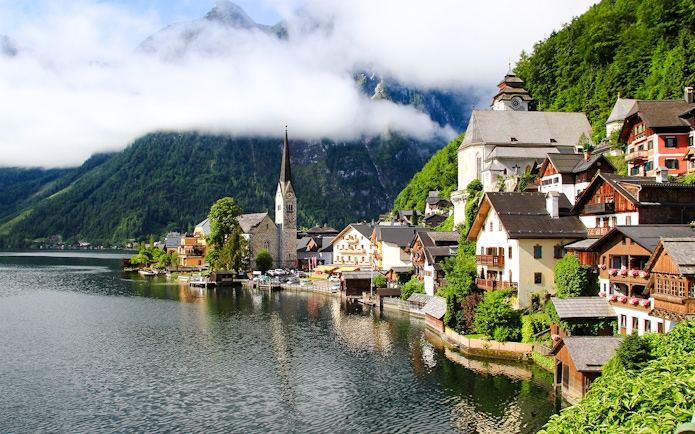 Hallstatt old town with church and lake, Austria.