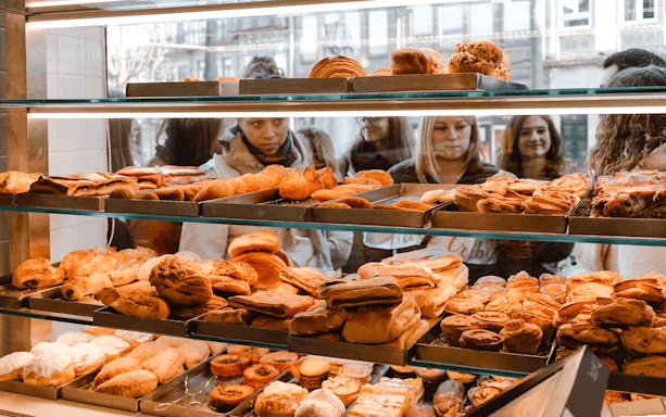Pastry display at a Porto bakery during the Original Porto Petiscos Crawl.