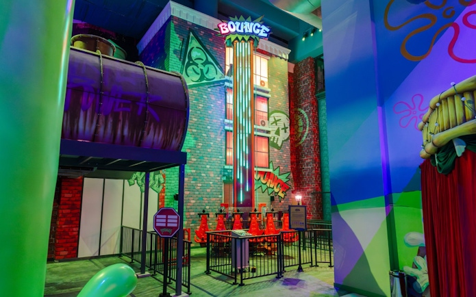 Bounce ride in TMNT zone at Nickelodeon Play Tersane Istanbul with colorful graffiti walls.