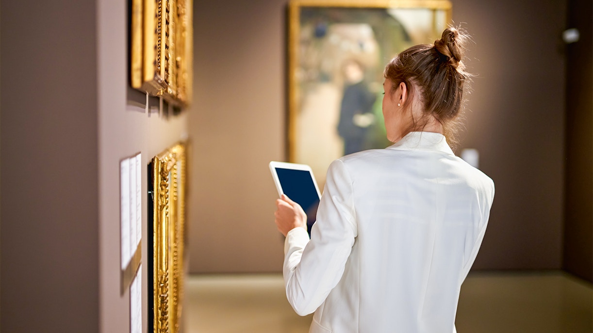 visitors viewing exhibition inside museum