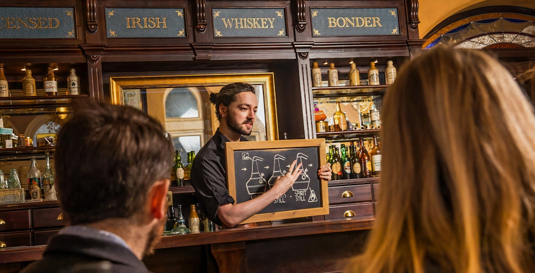 Guests exploring exhibits at the Irish Whiskey Museum in Dublin during the classic tour.