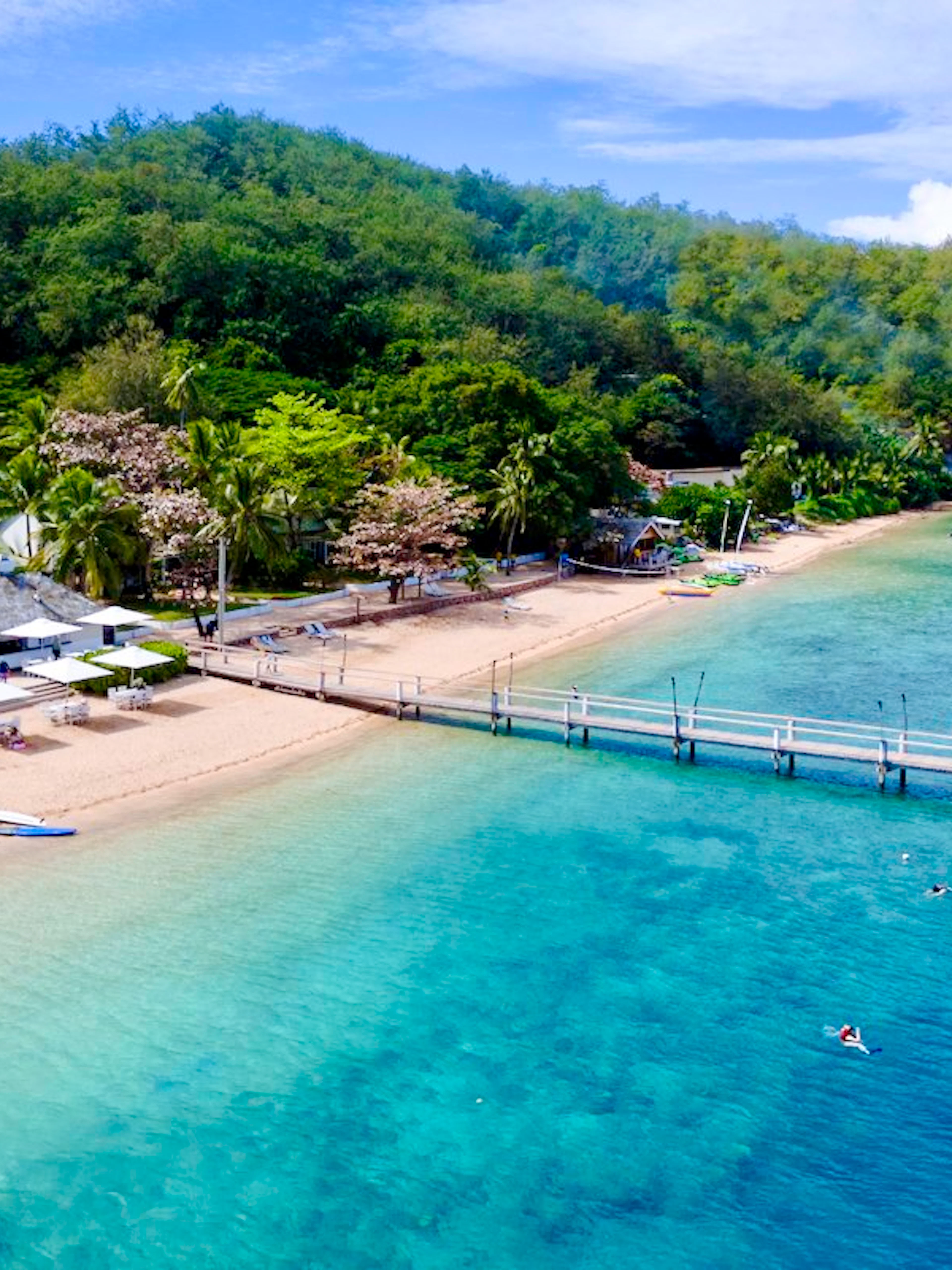 Aerial view of Malolo Island Resort beach and pier, Fiji.