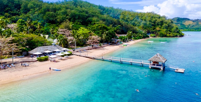 Aerial view of Malolo Island Resort beach and pier, Fiji.