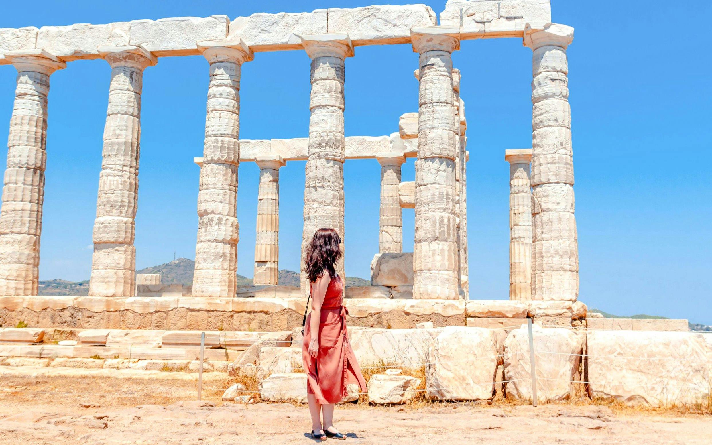 Guest exploring the Temple of Poseidon in Athens, Greece.