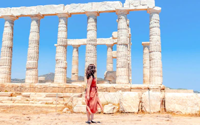 Guest exploring the Temple of Poseidon in Athens, Greece.