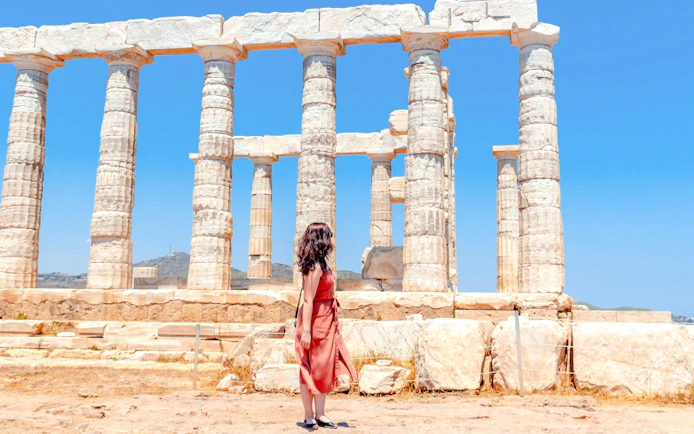 Guest exploring the Temple of Poseidon in Athens, Greece.