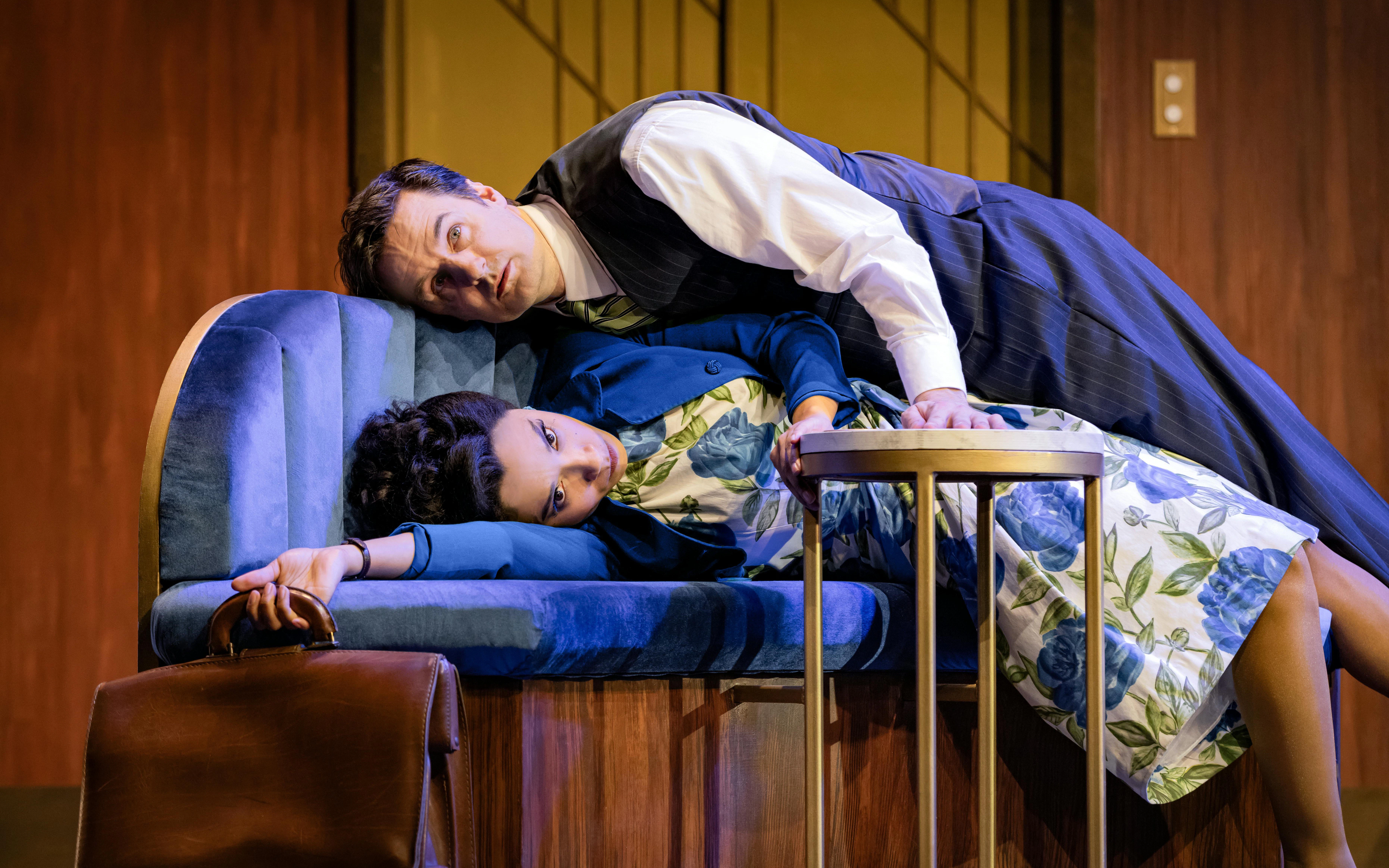 Actors in a comedic scene from "The Comedy About Spies" on stage.