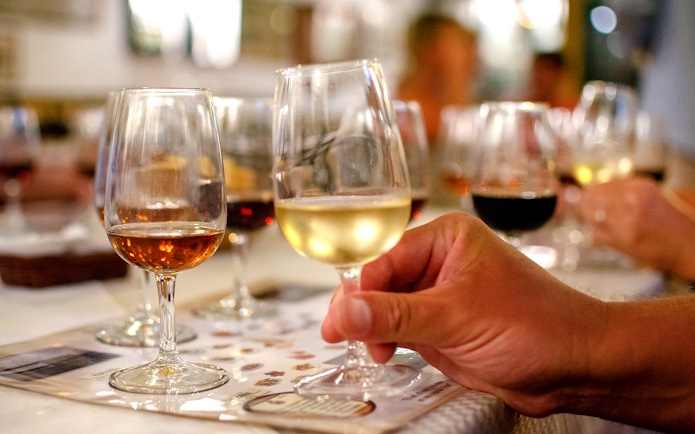 Wine glasses on a table during Niagara Falls evening tour tasting event.