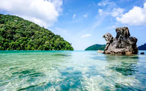 Surin Islands clear waters and rock formations, Krabi day tour.