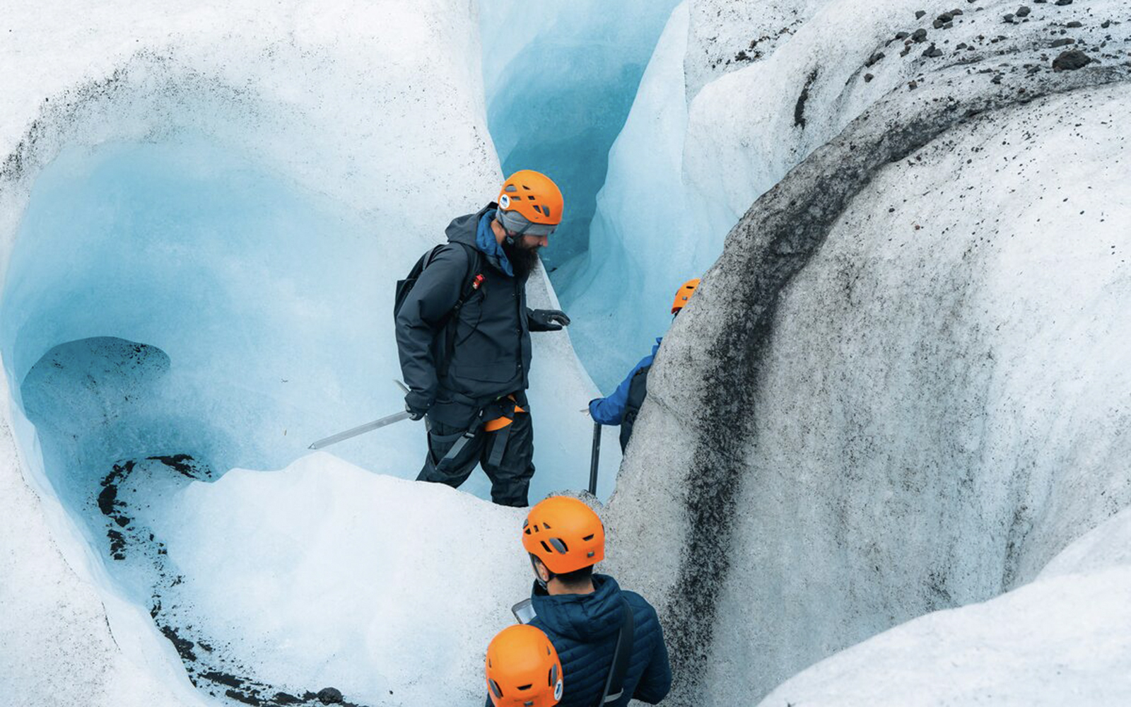 Guests exploring inside Blue Ice Cave in Vatnajökull, Iceland.