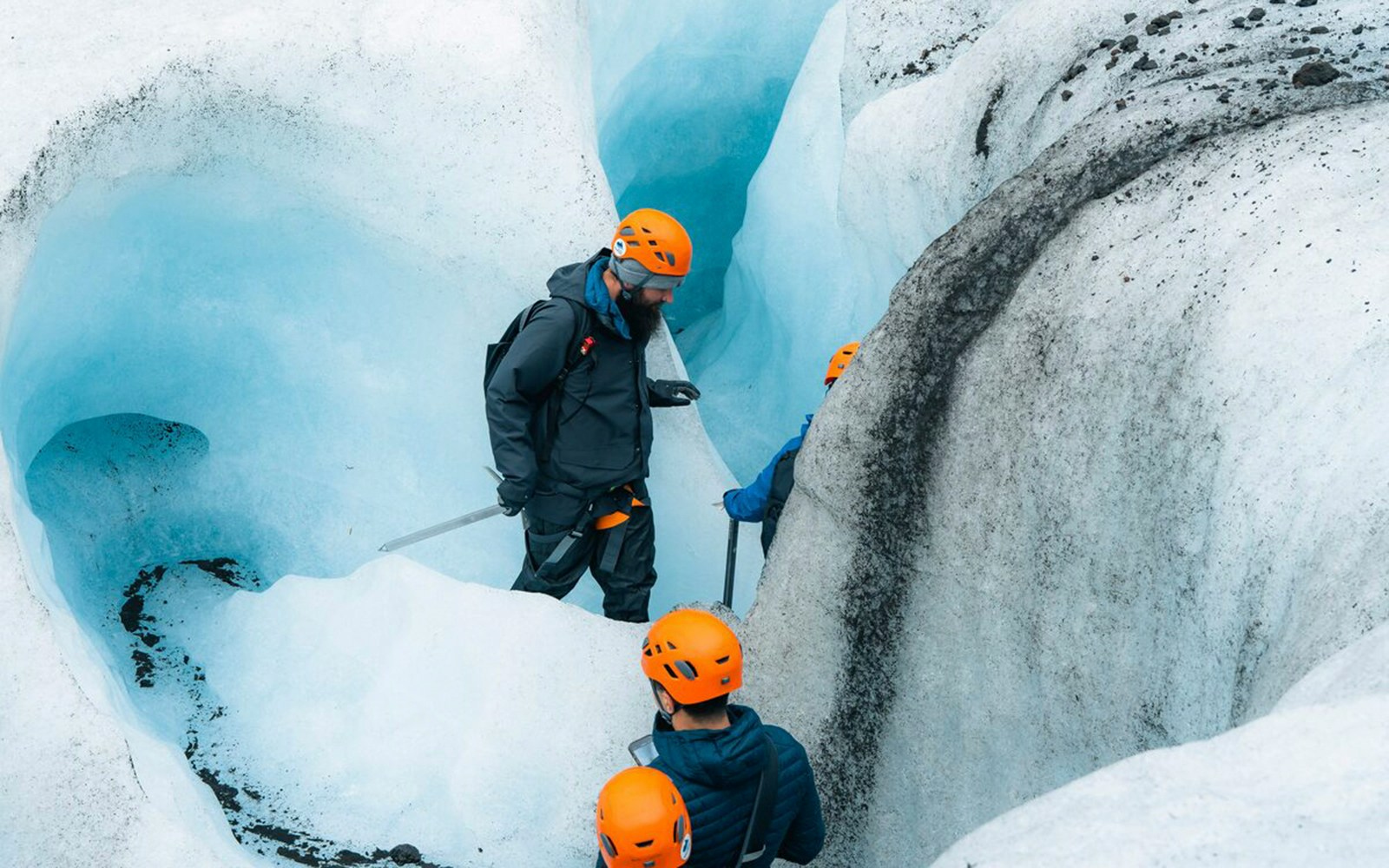 Guests exploring inside Blue Ice Cave in Vatnajökull, Iceland.