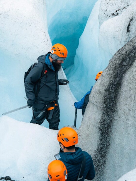 Guests exploring inside Blue Ice Cave in Vatnajökull, Iceland.