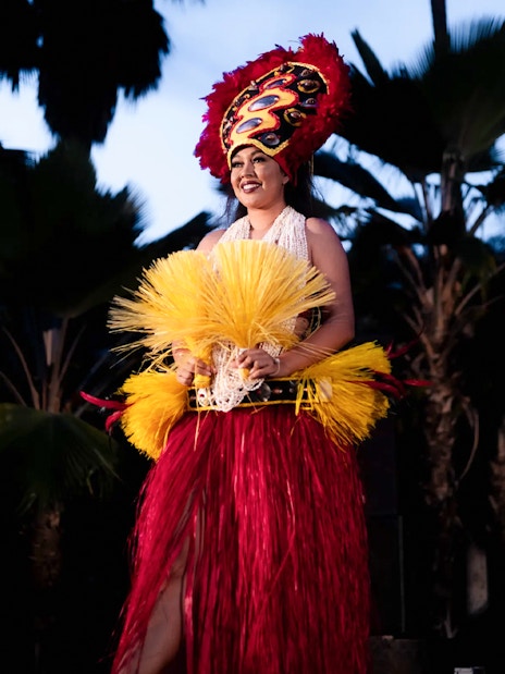Performer in traditional attire at Chief's Luau, Oahu, Hawaii.