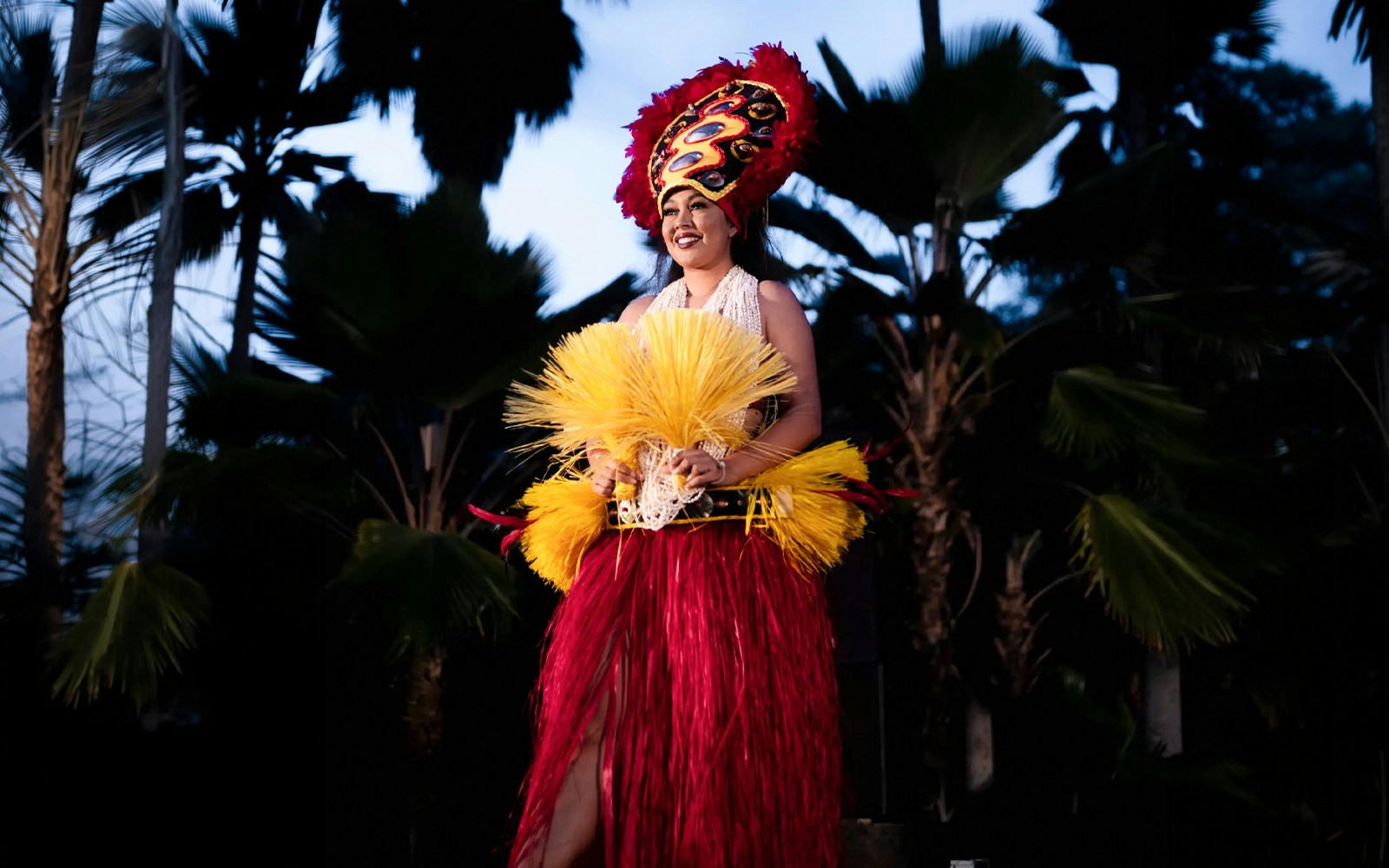 Performer in traditional attire at Chief's Luau, Oahu, Hawaii.