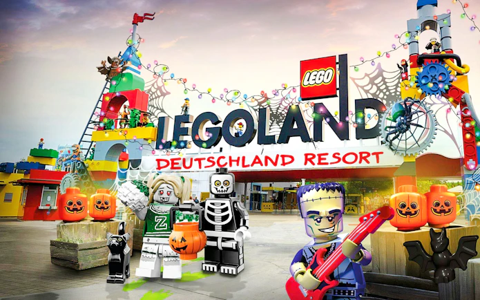 Legoland Billund entrance decorated for Halloween with Lego figures and pumpkins.