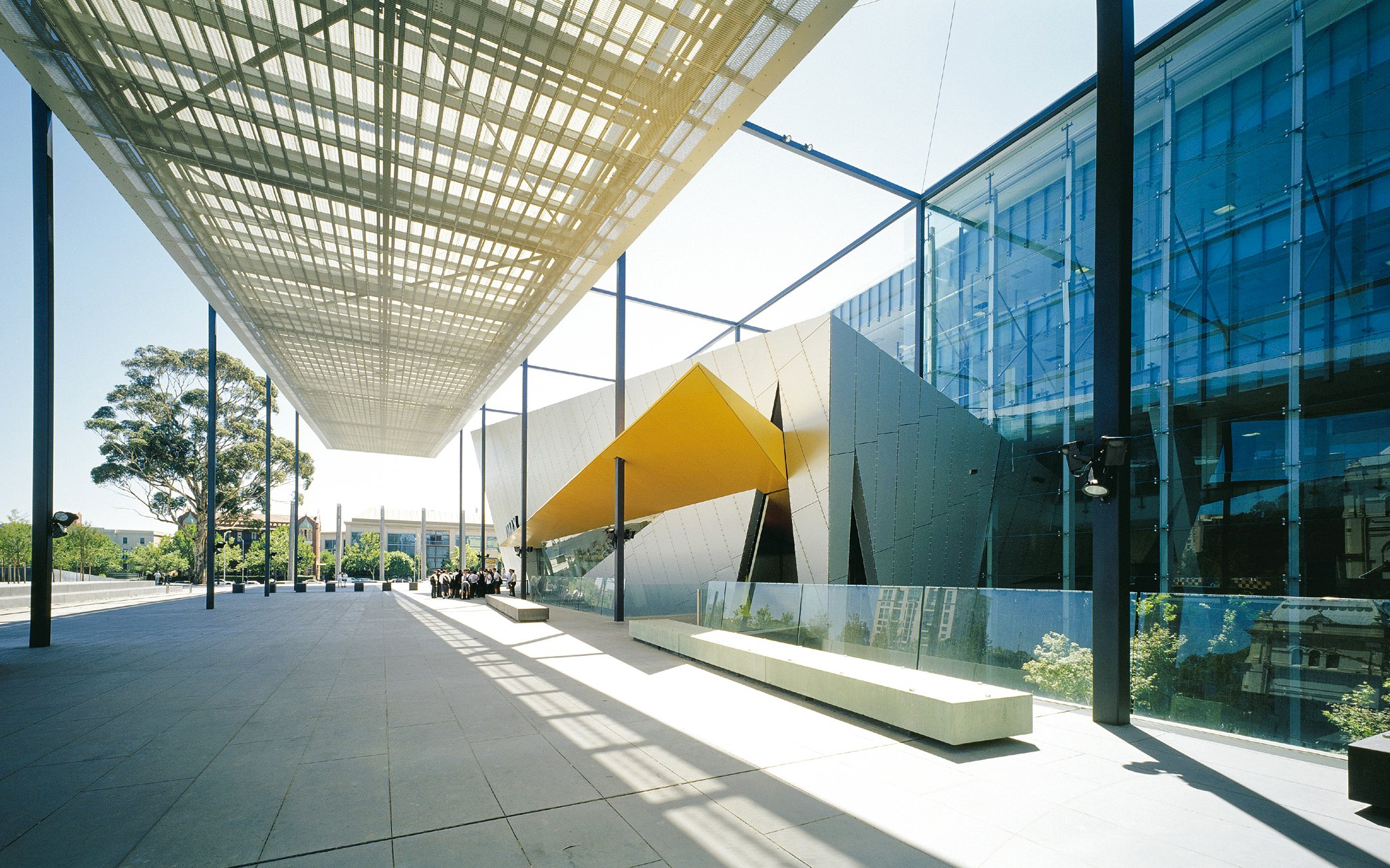 Melbourne Museum entrance with modern architecture and glass facade.