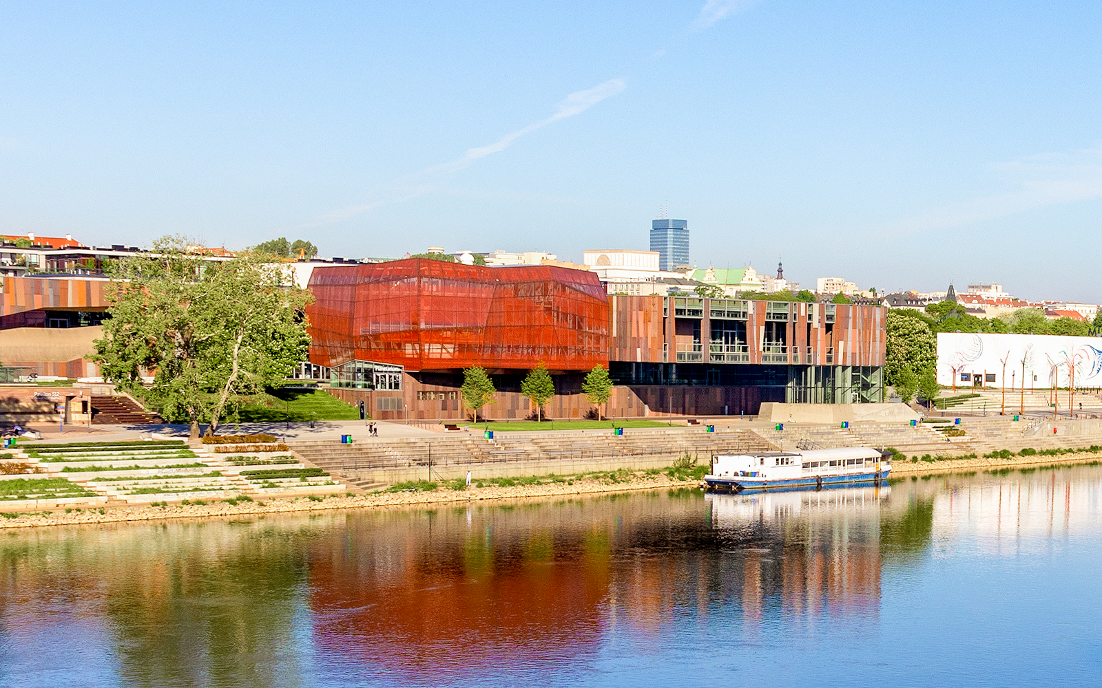 Copernicus Science Center in Warsaw with river view and modern architecture.
