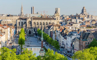 Central Brussels with Sainte-Catherine Church and cityscape, part of self-guided exploration game.
