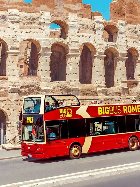 Big Bus tour near the Colosseum in Rome, Italy.