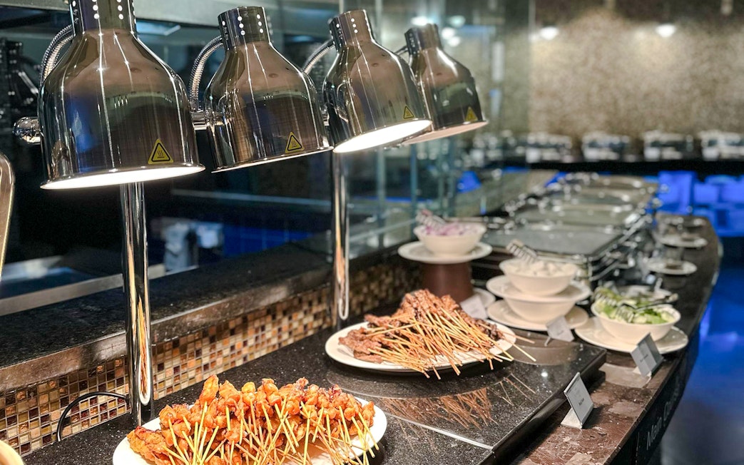 Skewers and dishes at lunch buffet, ORBIT Revolving Dining, KL Tower.
