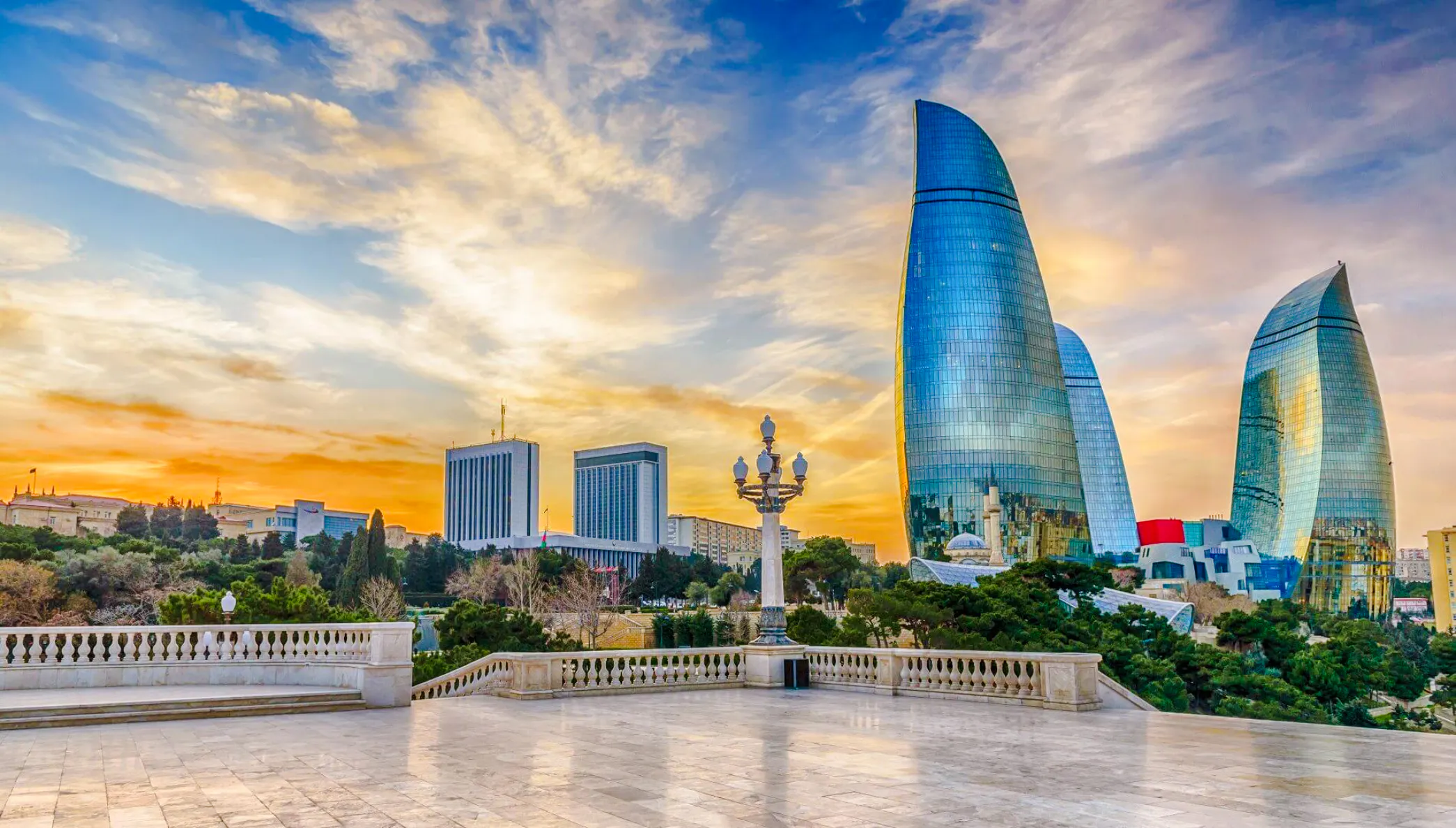 Flame Towers and cityscape at sunset, Baku City Tour, Baku.