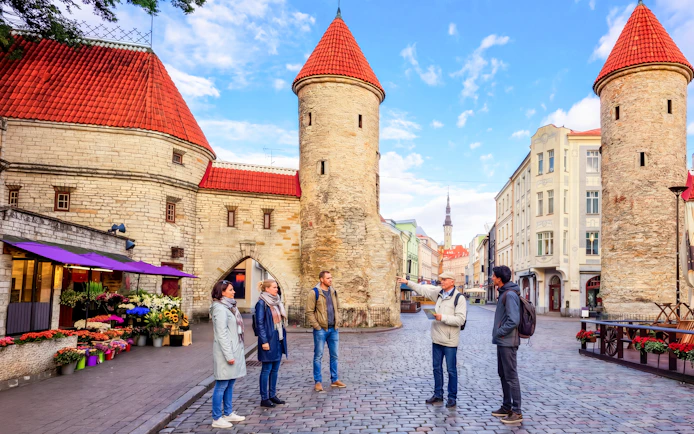 Tour group at Viru Gate in the old town of Tallinn, Estonia.