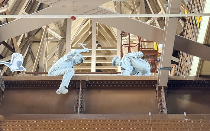 Workers' statues on Tower Bridge exhibit, London.