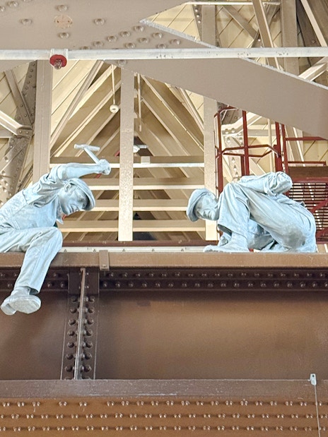Workers' statues on Tower Bridge exhibit, London.