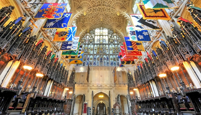The Lady Chapel interior with ornate ceiling and colorful banners, Westminster Abbey.