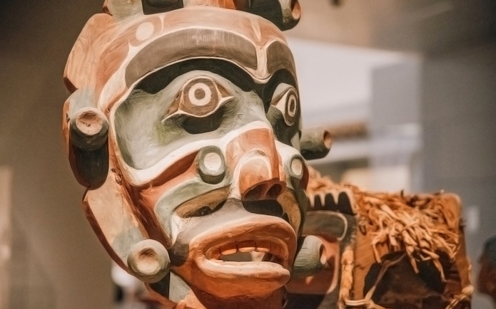 Wooden mask exhibit at the Metropolitan Museum of Art.